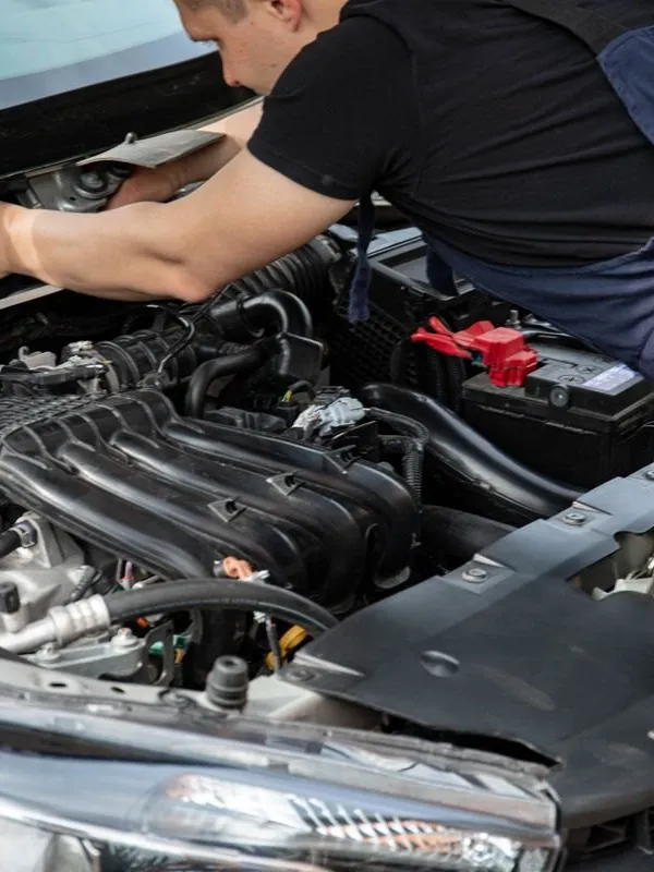 Battery service under the bonnet